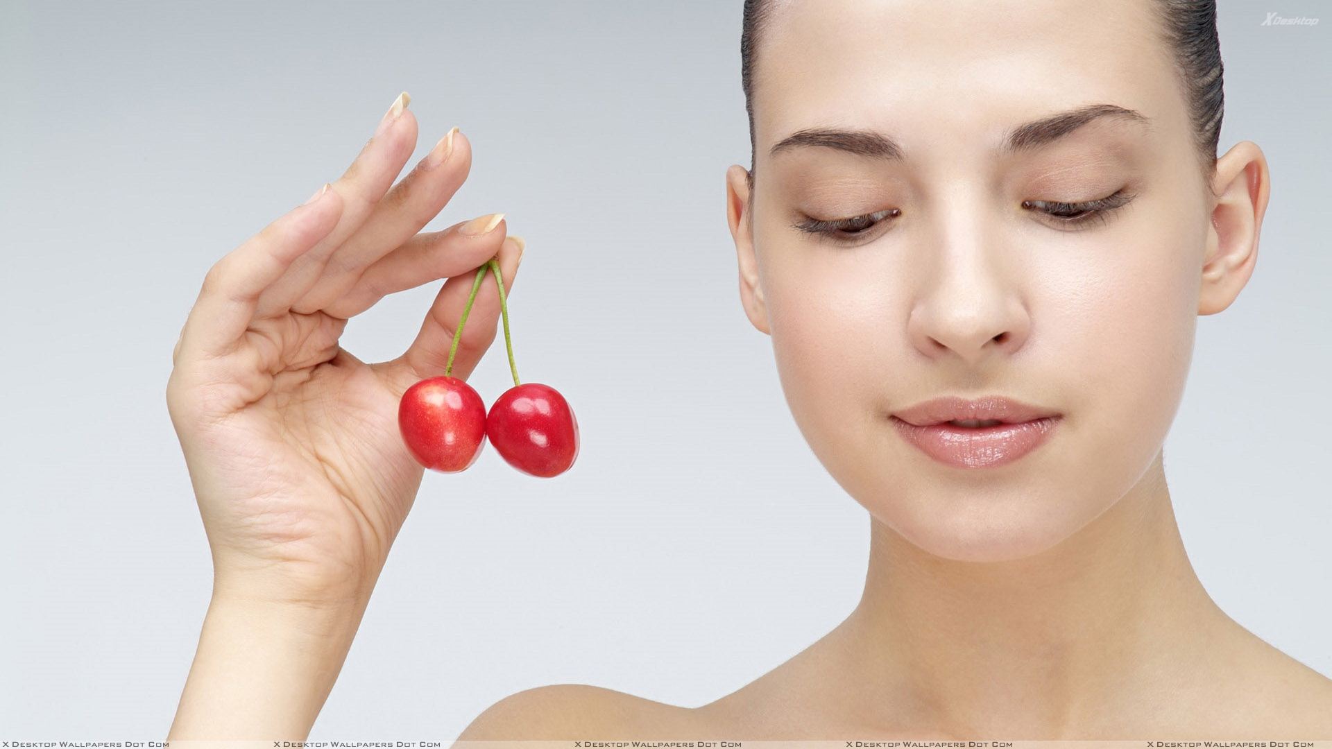Girl Showing Red Cherry In Hand Photoshoot